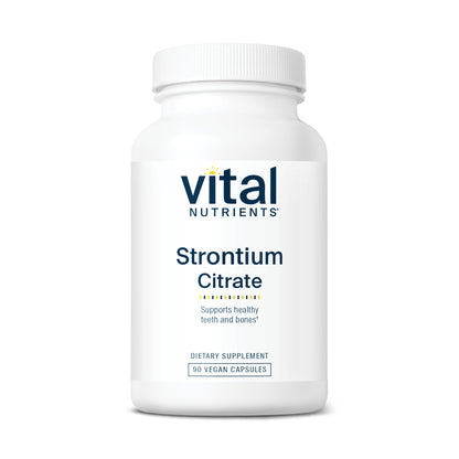 A white bottle labeled "Vital Nutrients Strontium Citrate" with 90 vegan capsules, promoting healthy teeth and bones.